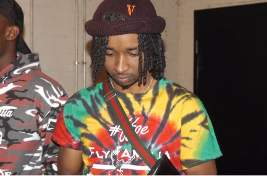 Super Producer Spiffy Global Supports Fly Familia